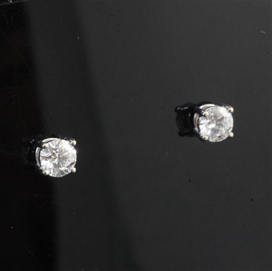 A pair of 18ct gold and solitaire diamond ear studs,